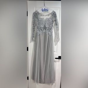 Elegant gray dress with satin skirt and tulle overlay skirt. Formal dress.